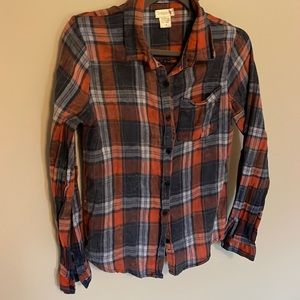 PASSPORT brand.   Lightweight flannel top.  Perfect for the scarecrow costume!